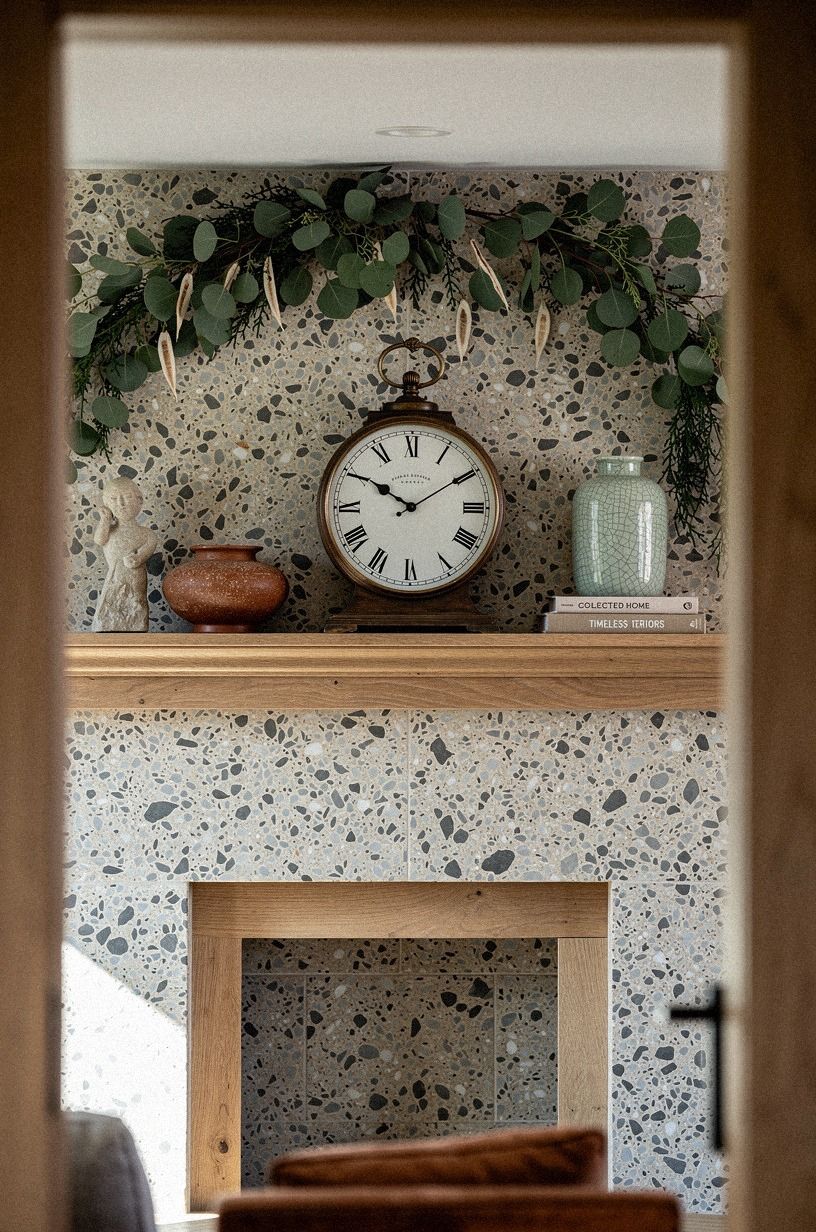 Frame the clock with trailing eucalyptus garland