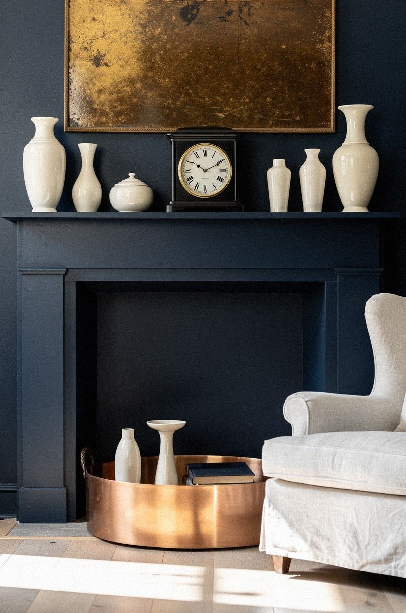 Balance a black clock with ivory ceramics