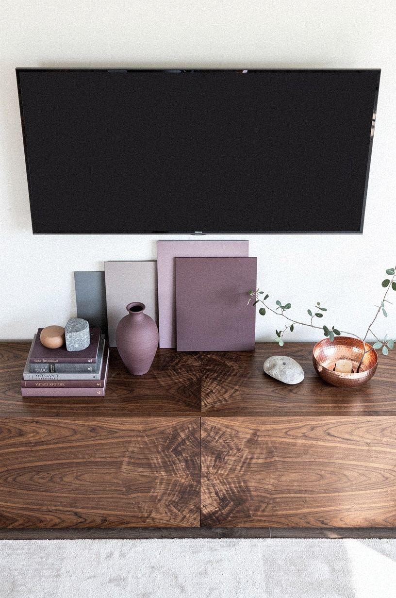 Lean matching art panels beside the screen