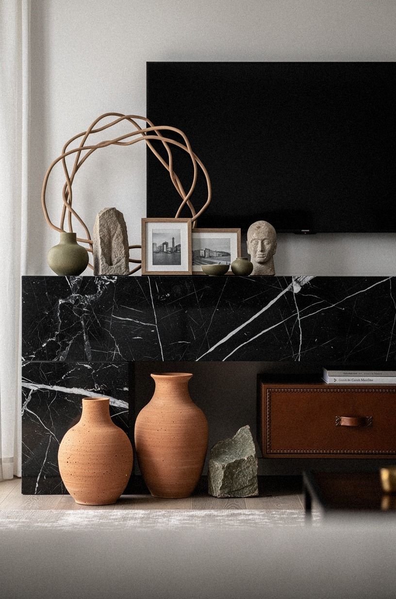 Float a sculptural wreath over stacked frames
