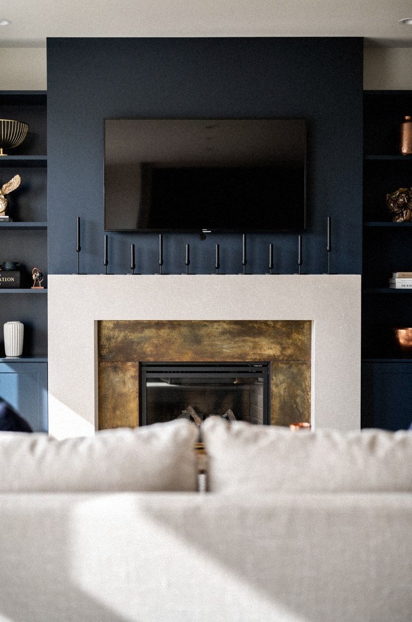 Add matte black candlesticks for repetition