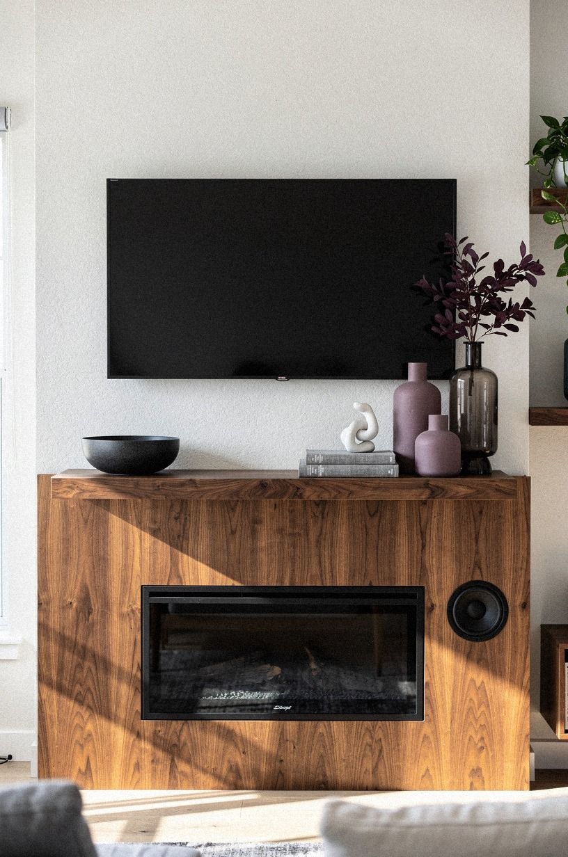 Slide slim speakers behind matching ceramic vases
