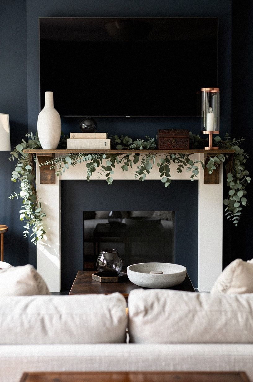 Tuck trailing eucalyptus along the mantel edge