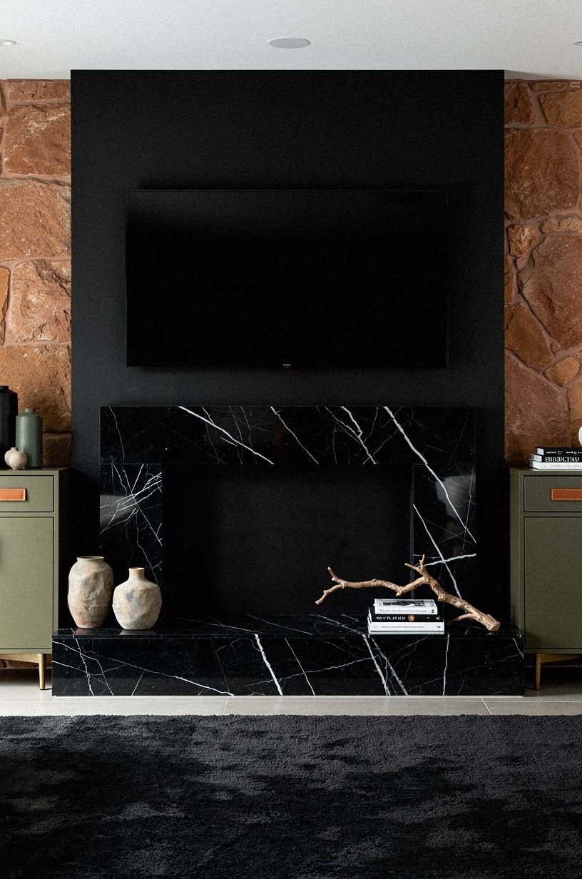 Ground the surround with a charcoal rug
