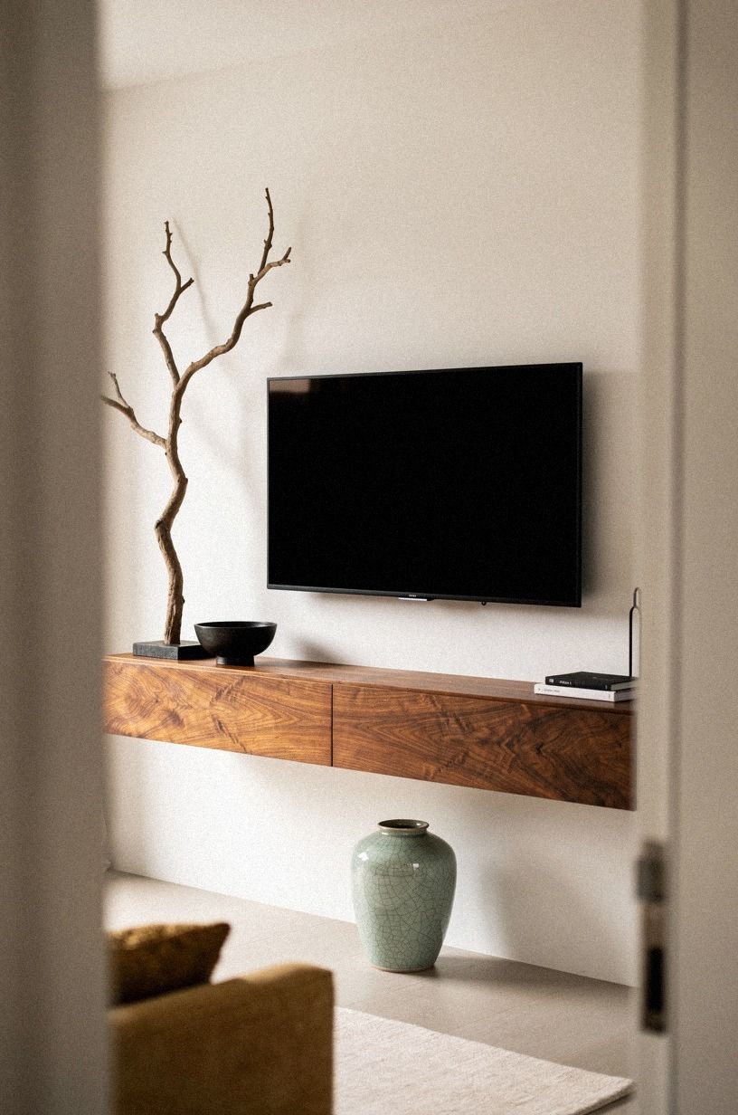 Balance the screen with one sculptural branch
