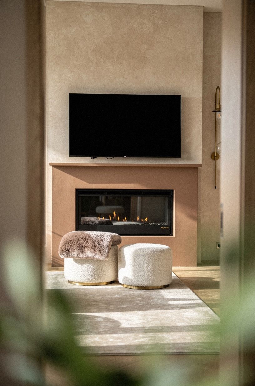 Styled the hearth with boucle floor stools