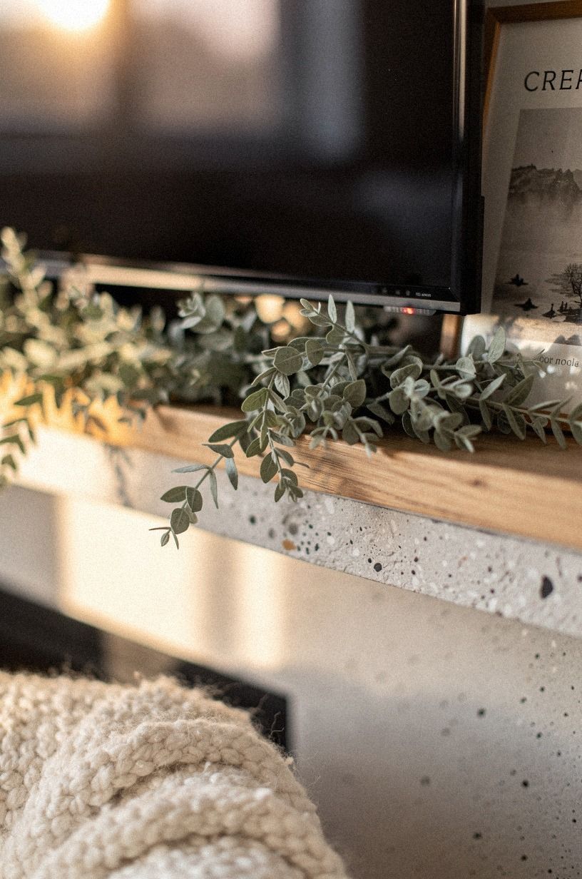 Weave garland below the frame, not around it