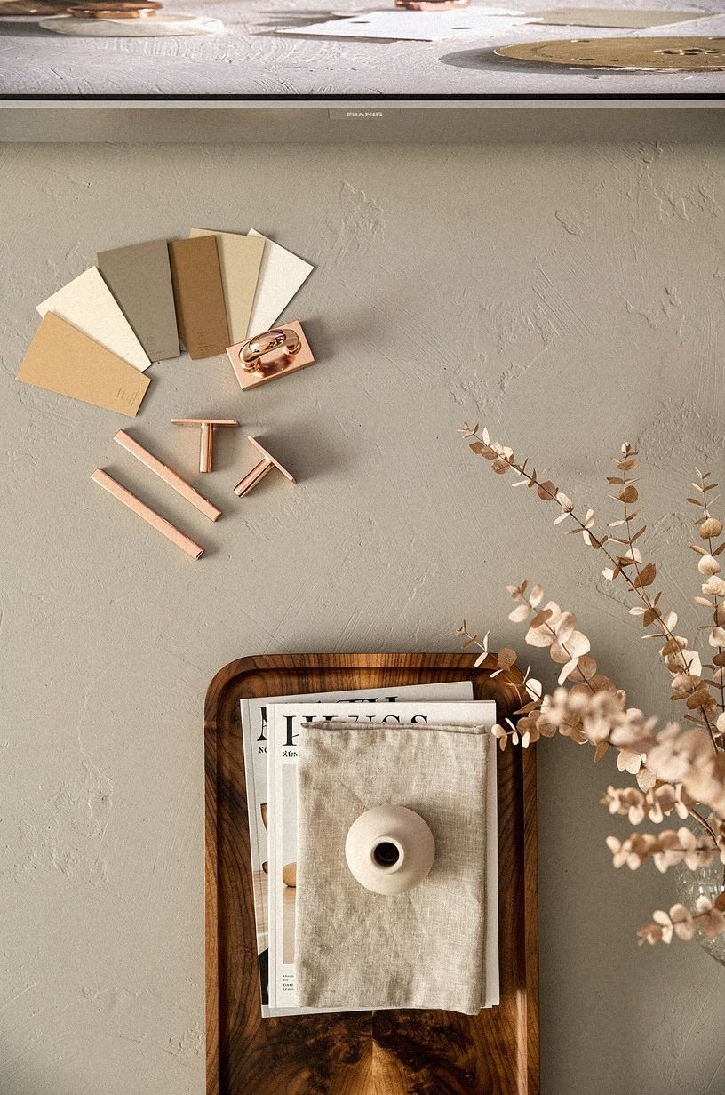 Paint the fireplace wall a warm greige