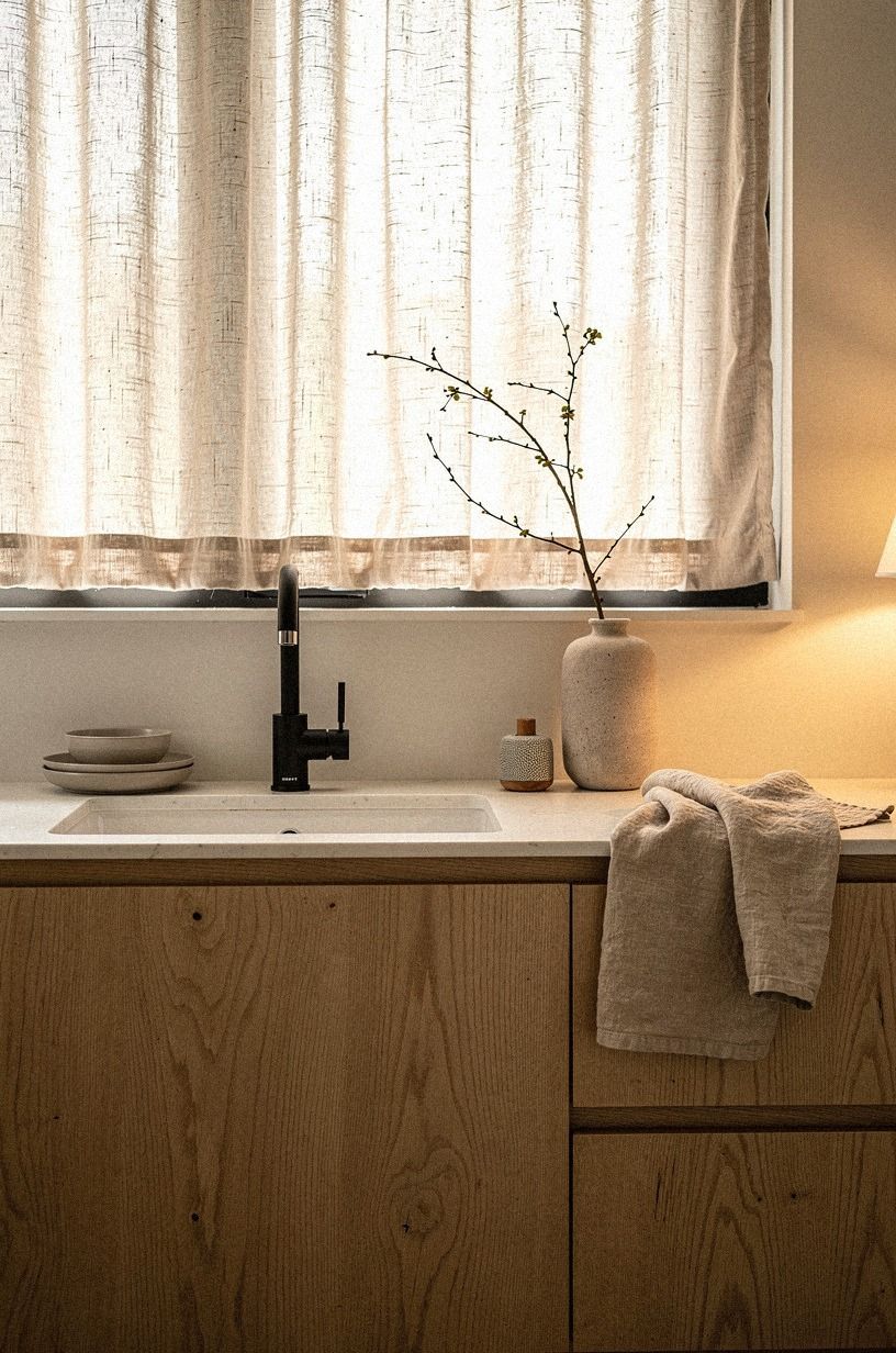 Soften the sink wall with woven cafe curtains