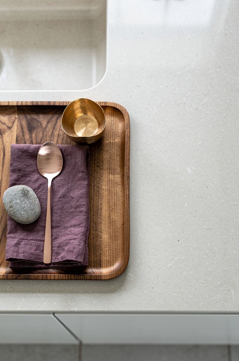 Layer pale stone counters with wood trays