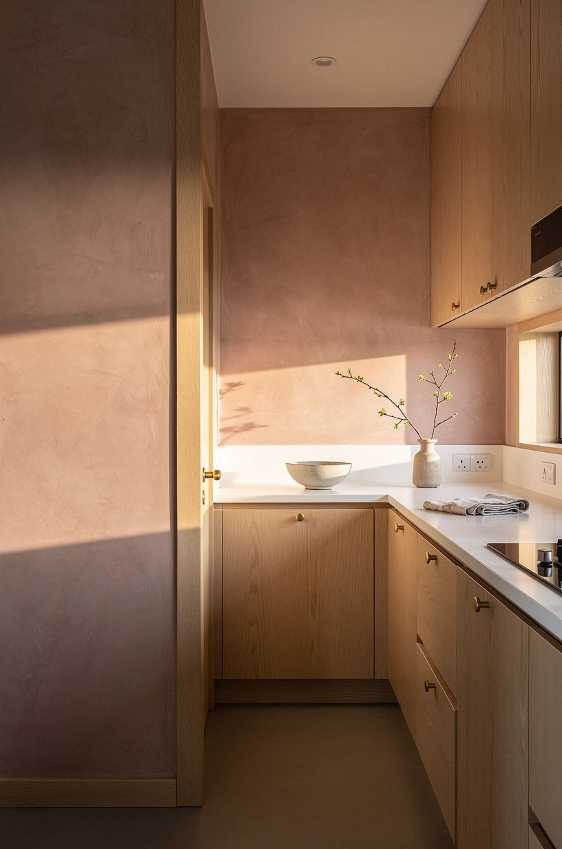 Frame the galley with pale wood trim