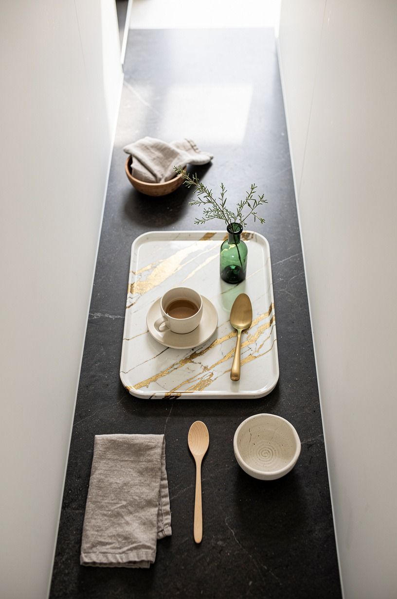Ground white walls with charcoal stone counters