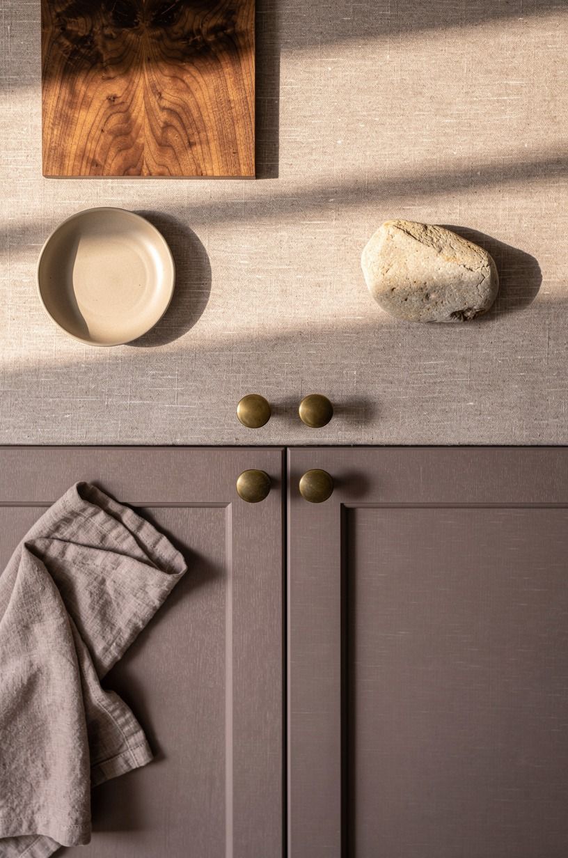 Pair linen doors with aged brass knobs