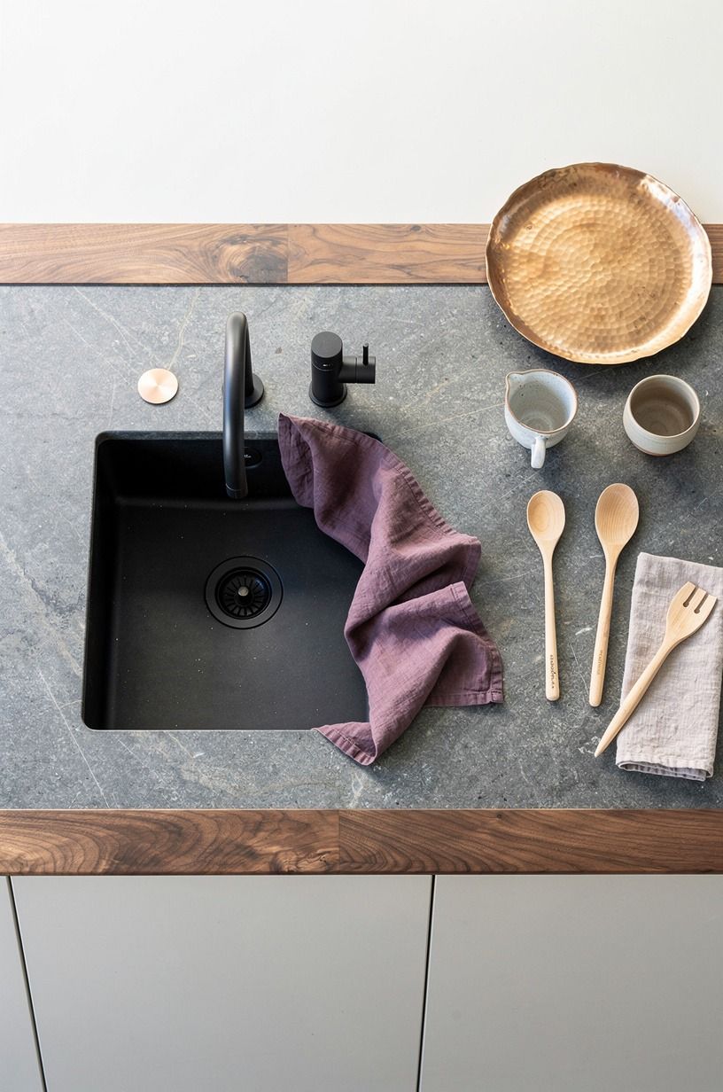Pair soapstone counters with a matte black faucet (stone over shine)
