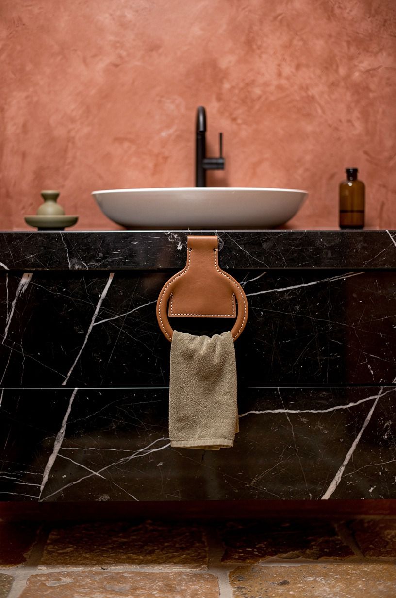 Why does a single sculptural towel ring beat the bar?