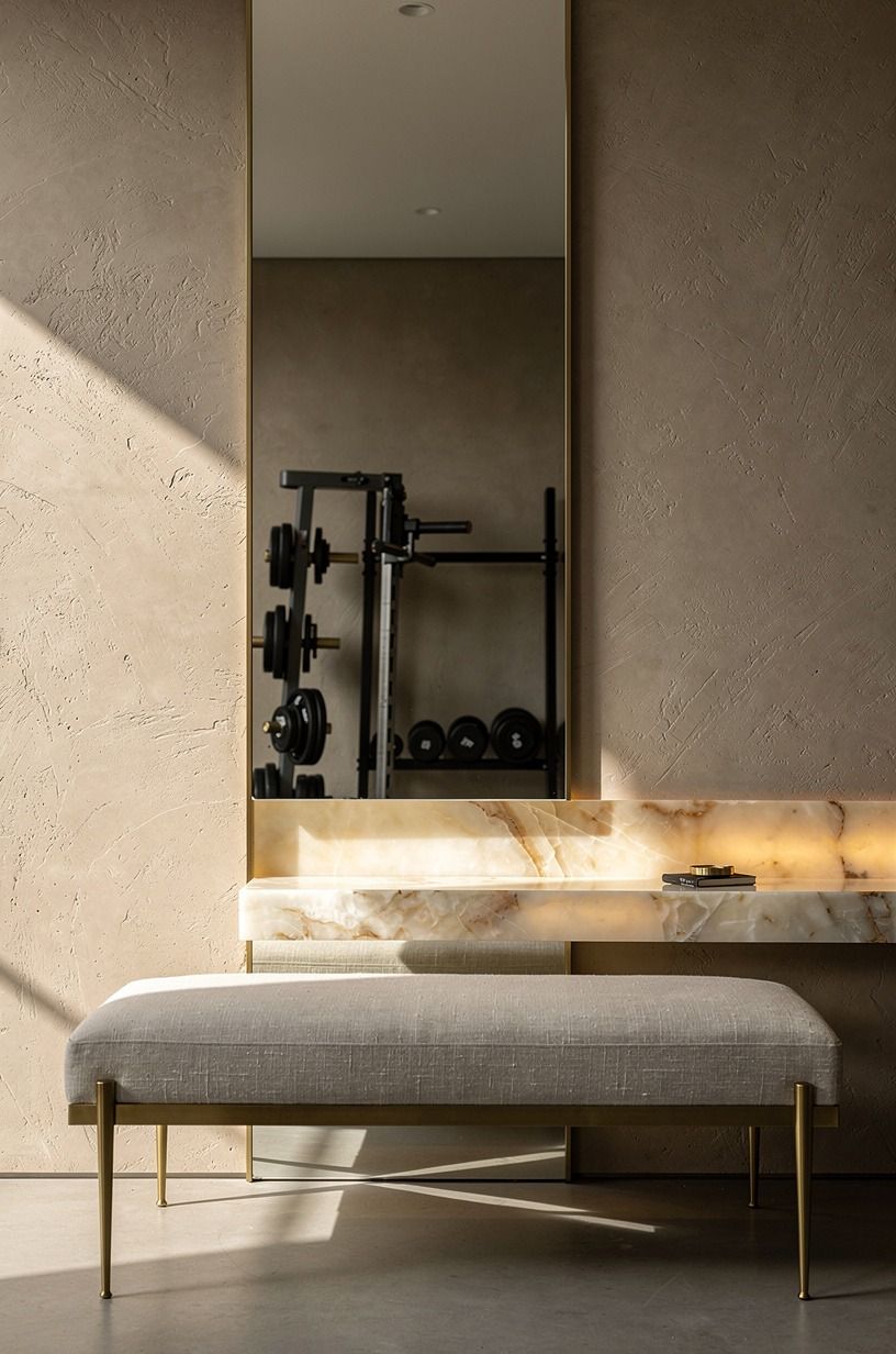 Anchor the room with a mirrored weight wall
