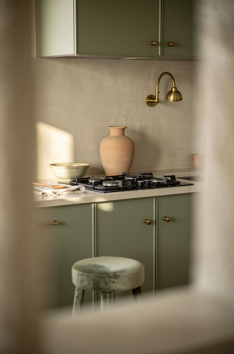 Placed a clay vase beside the cooktop