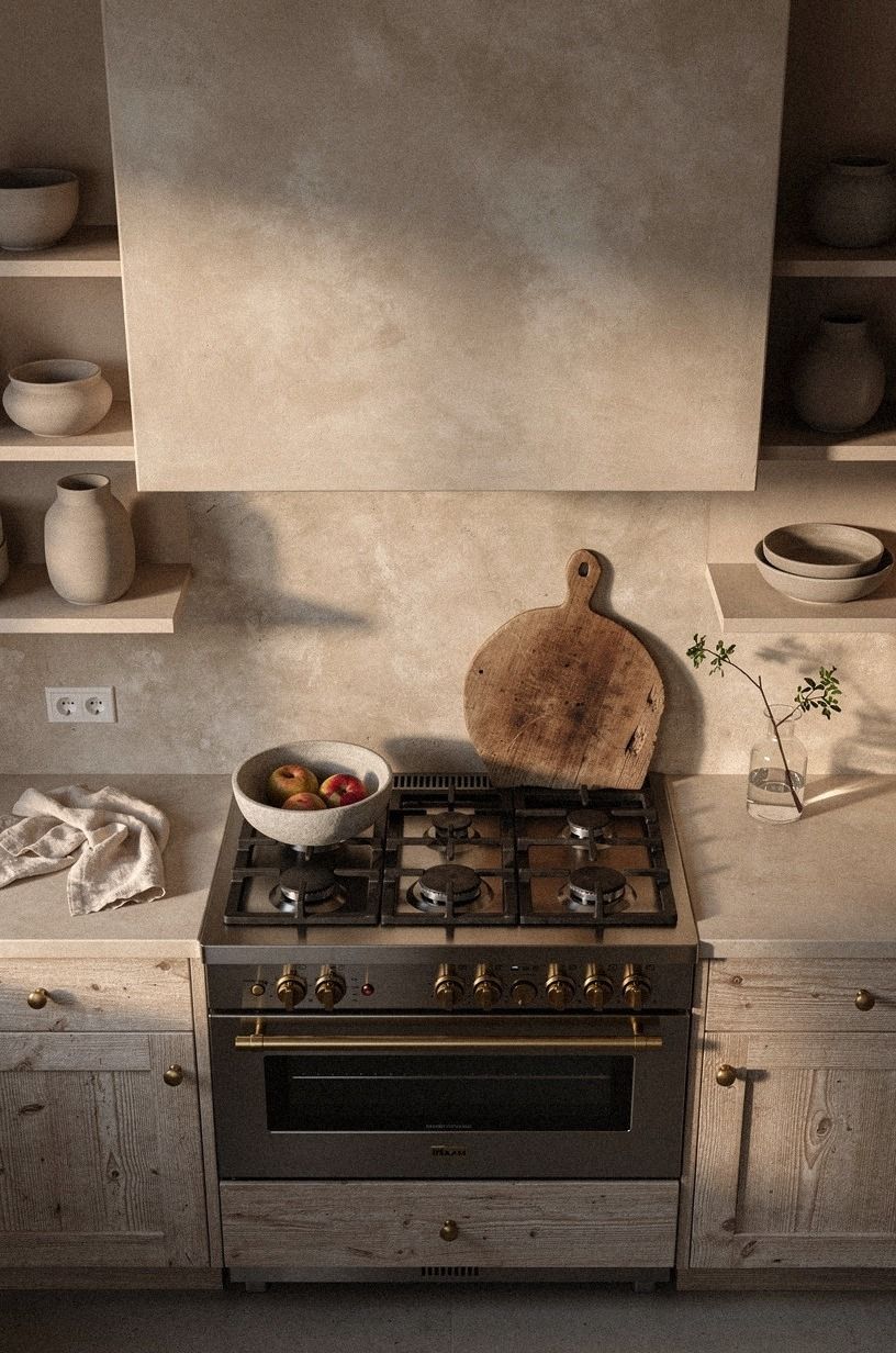 Lime-washed plaster behind the range