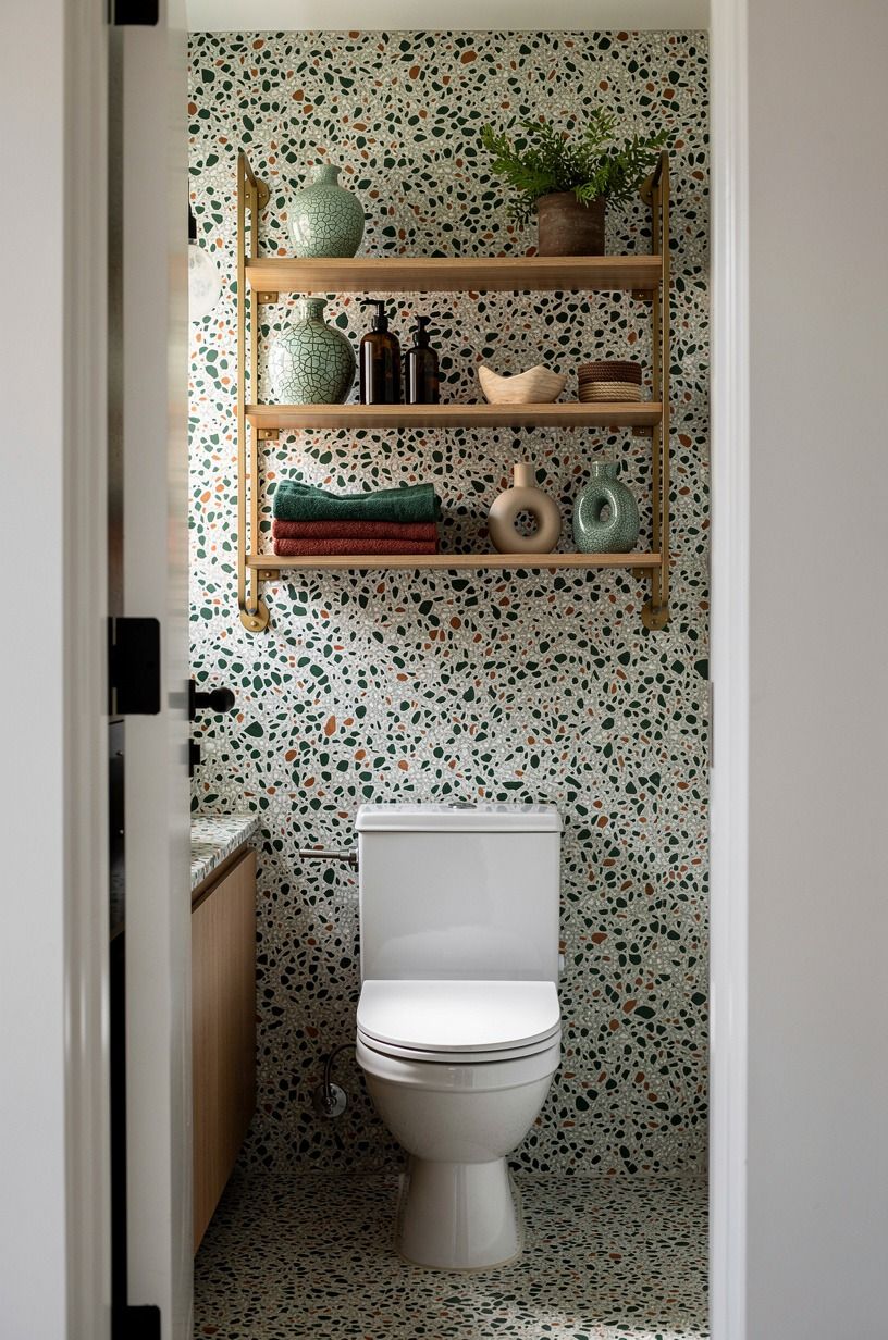 Tuck open brass shelving over the toilet