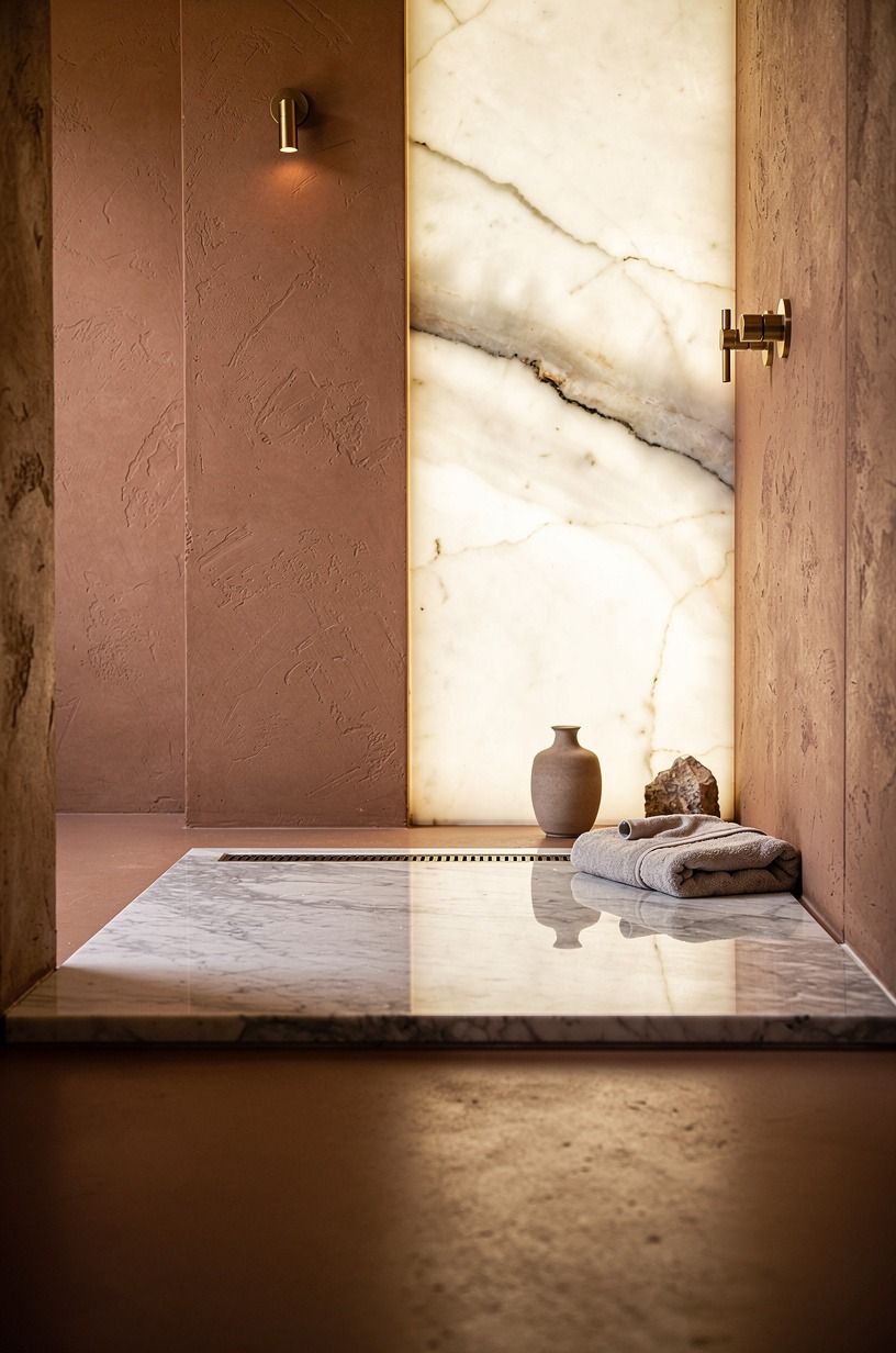 Drop the shower floor flush with marble