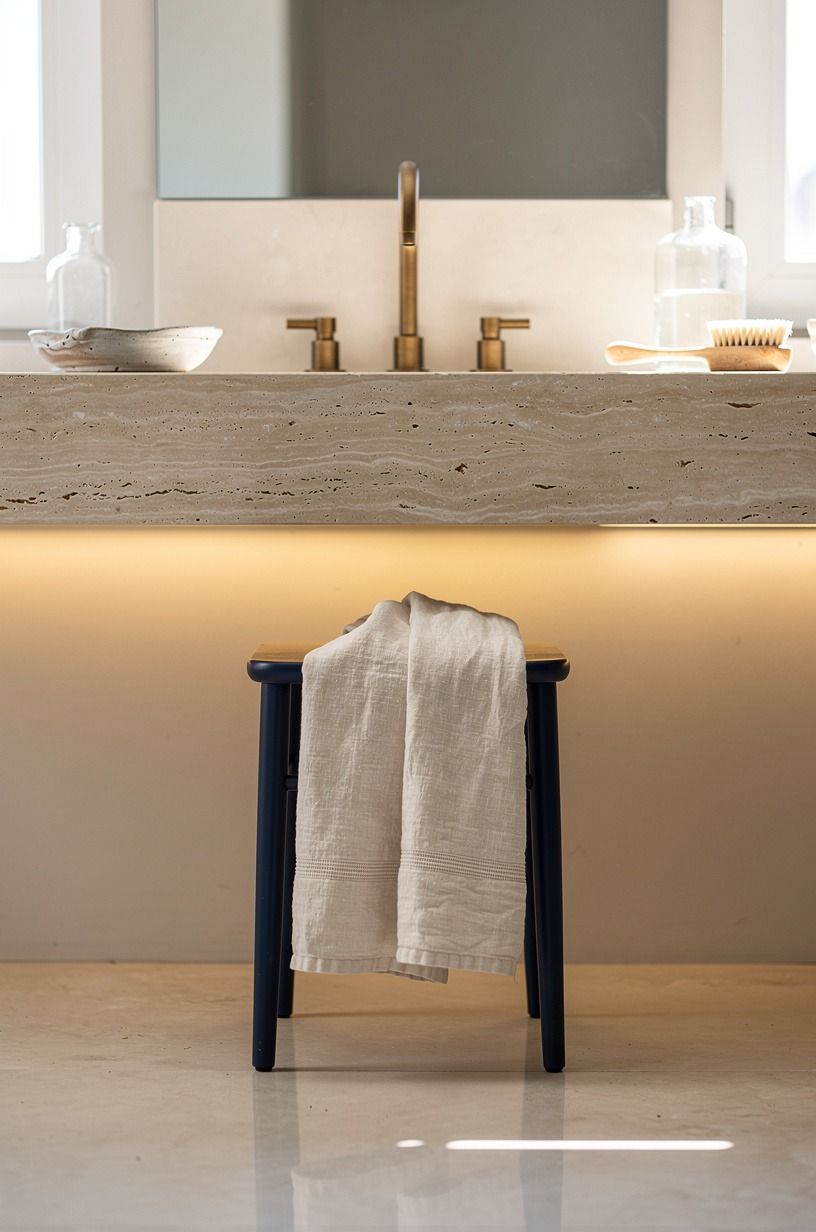 Backlight the vanity with a hidden warm LED strip