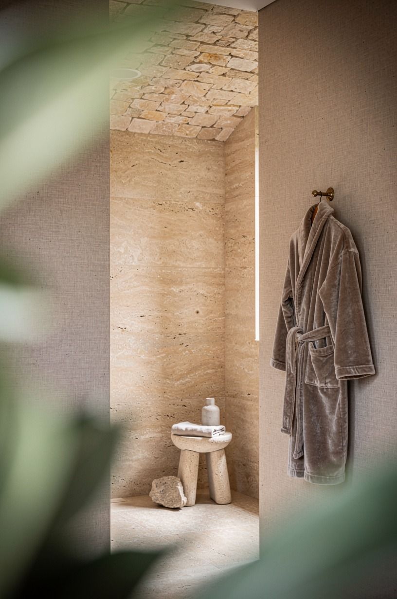 Wrap the shower ceiling in split-face stone