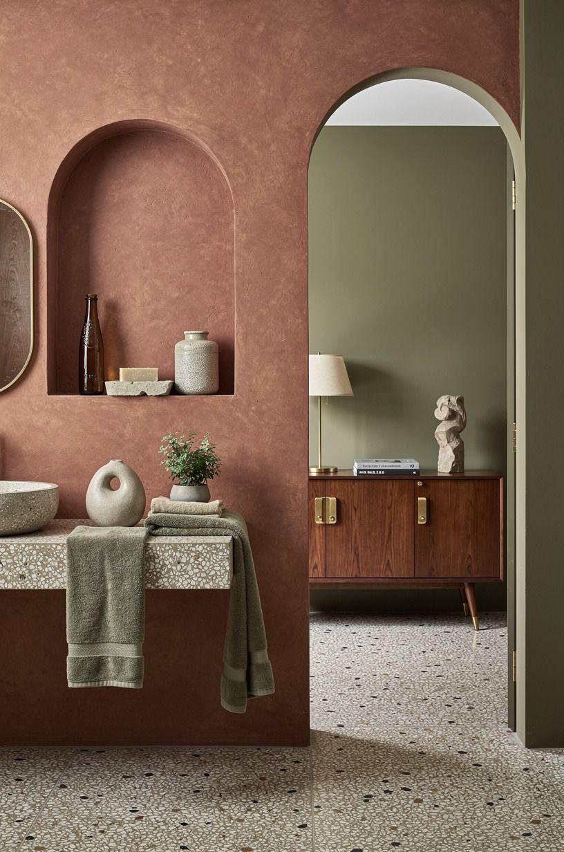 Frame an arched niche instead of a flat square shelf