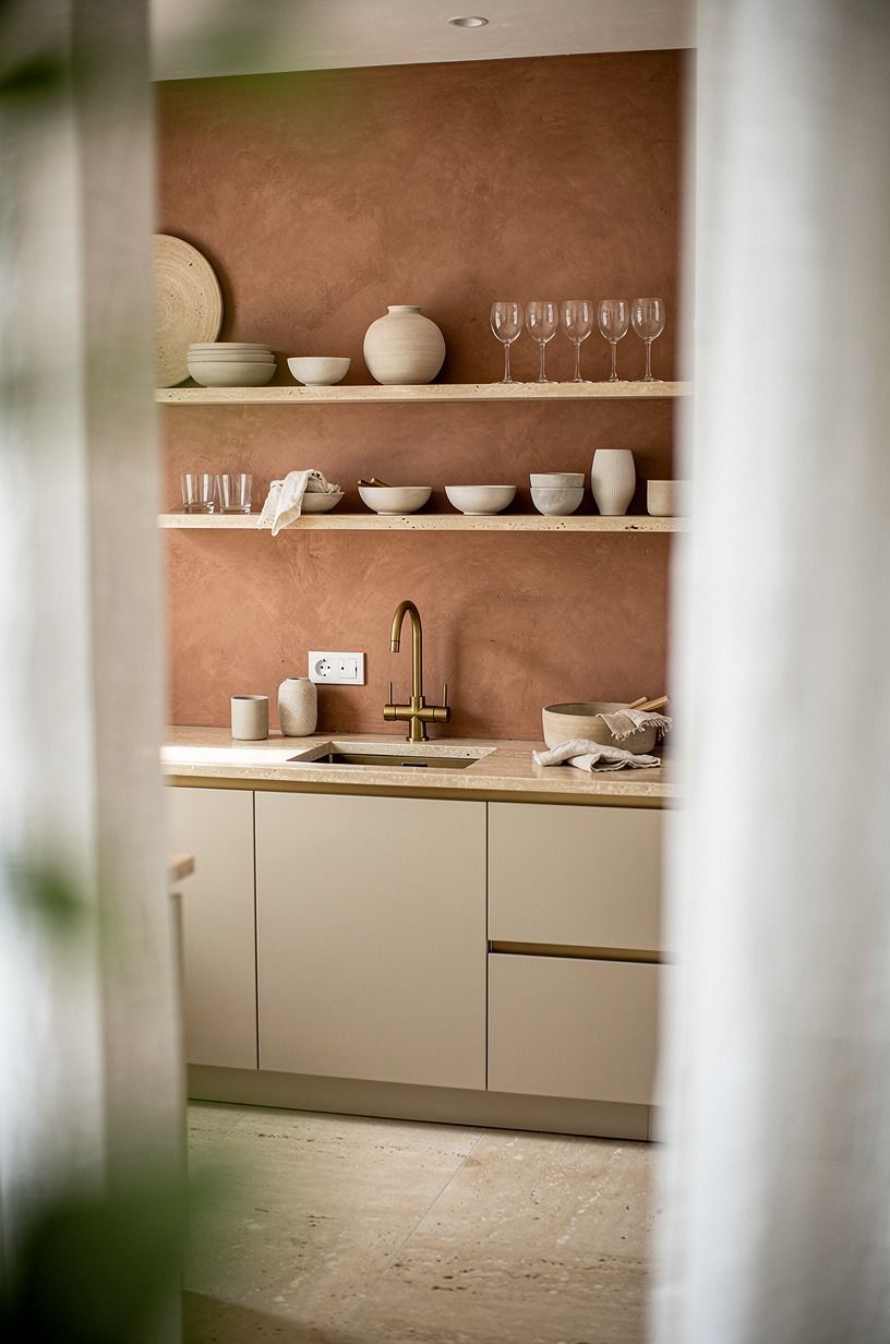 Paint a grounding wall in clay instead of adding more decor