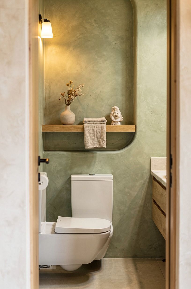 Float a shelf above the toilet (the useful vignette)