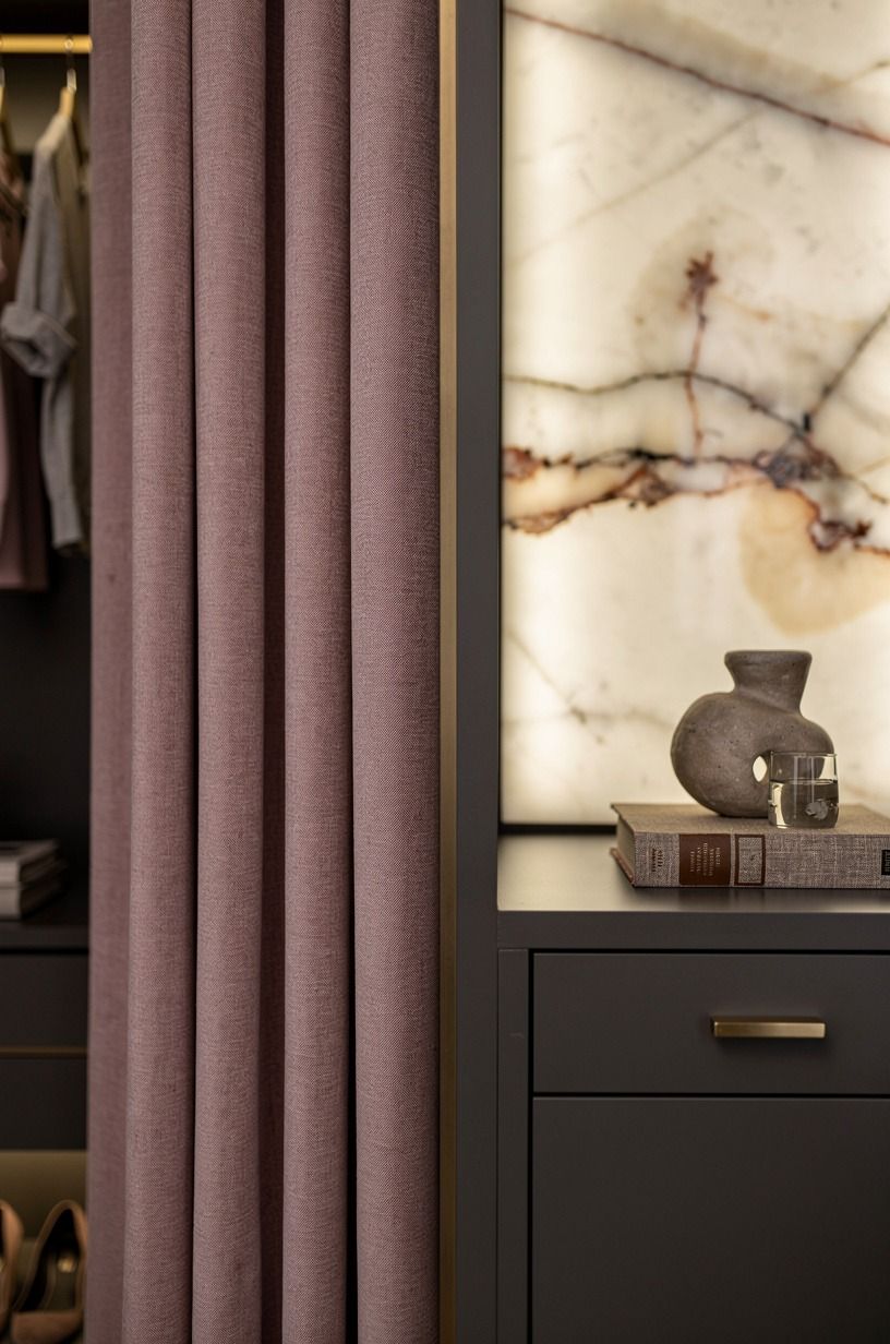 Swap bulky doors for a calm curtain wall