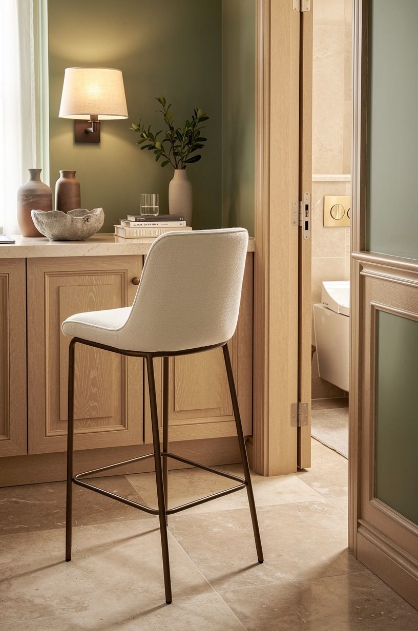 Add a seat that looks borrowed from a hotel bar