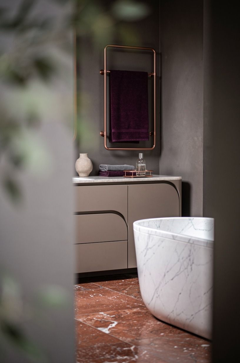 Choose red travertine over faux marble for the floor
