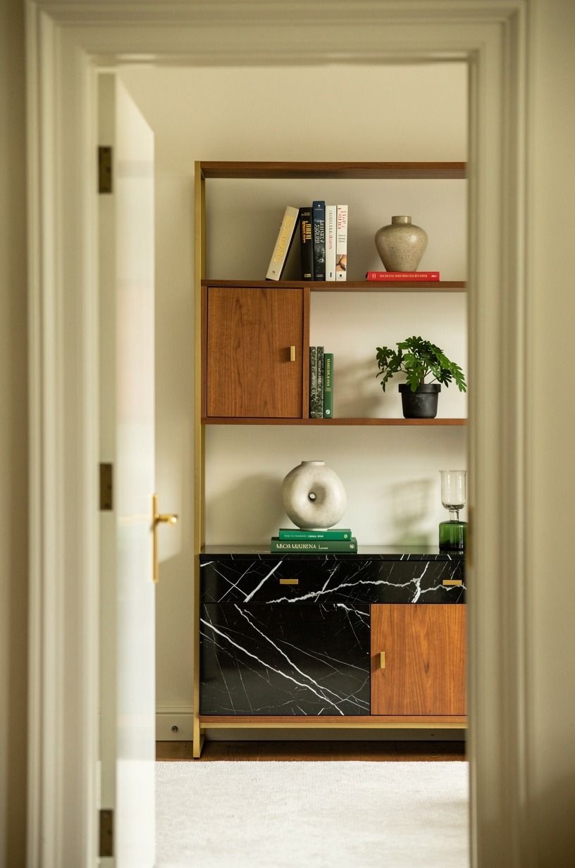Mix open shelves with one closed cabinet