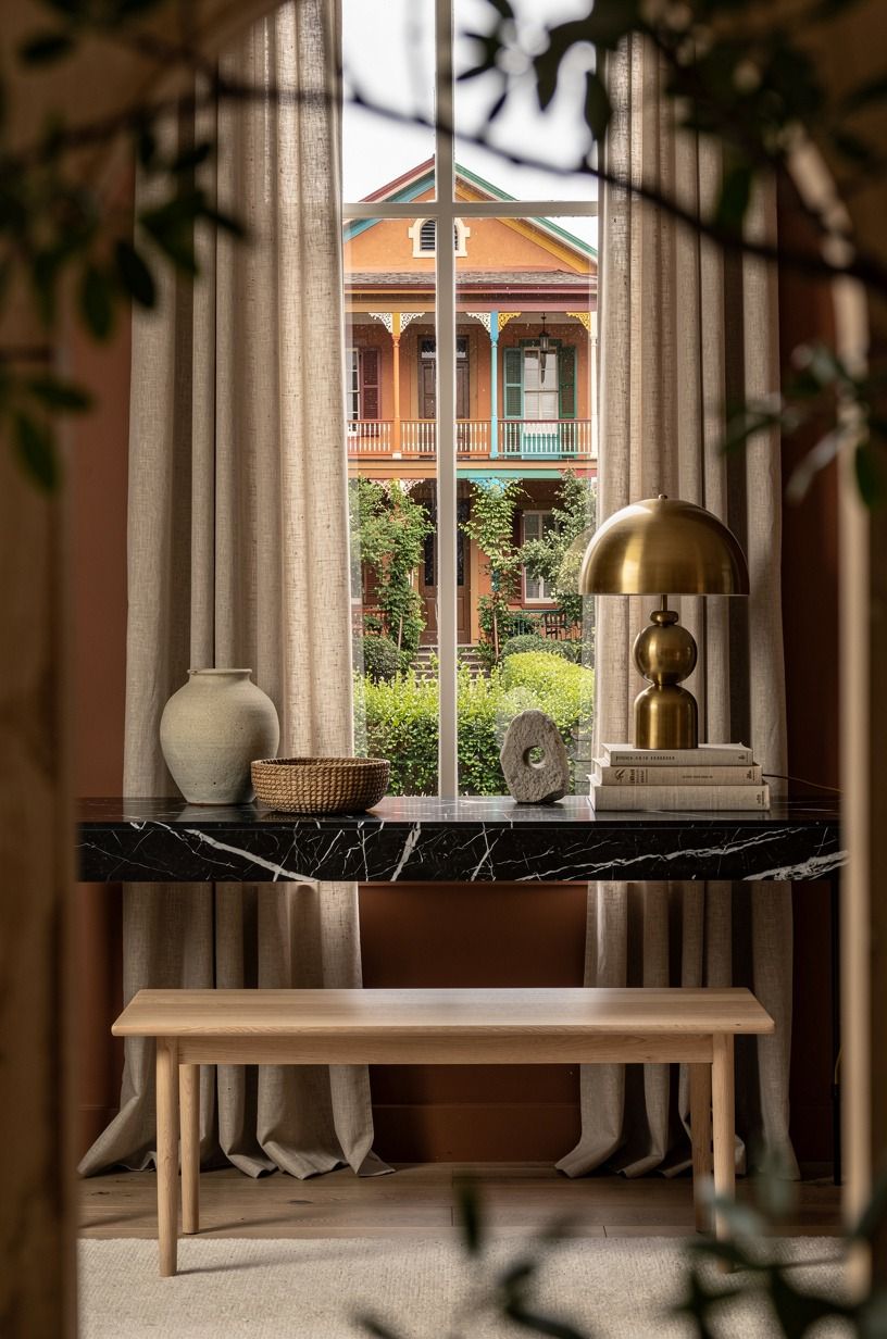 Frame a window with floor-length linen, not fussy valances