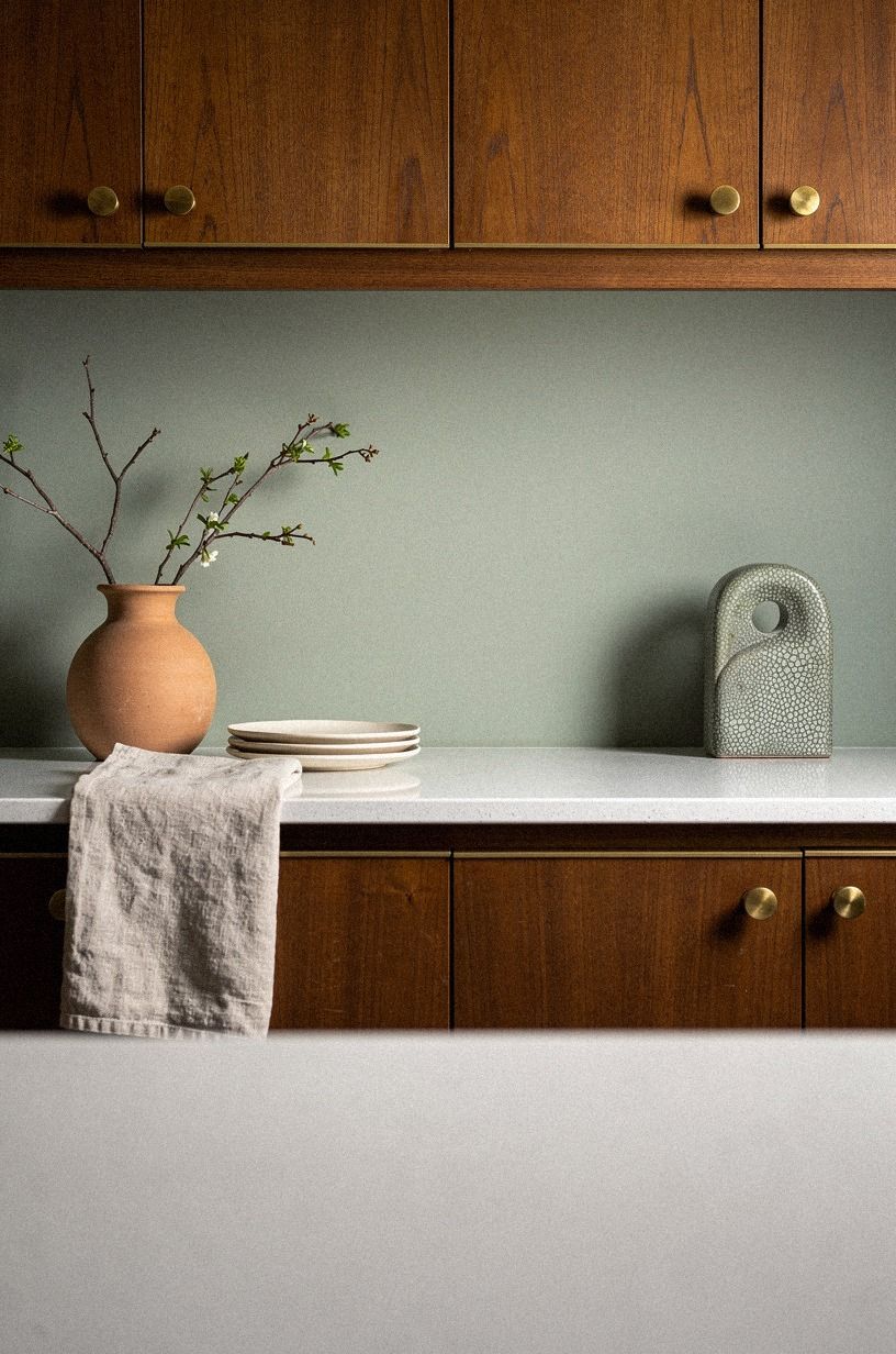 Use Sherwin-Williams Evergreen Fog on the quiet wall
