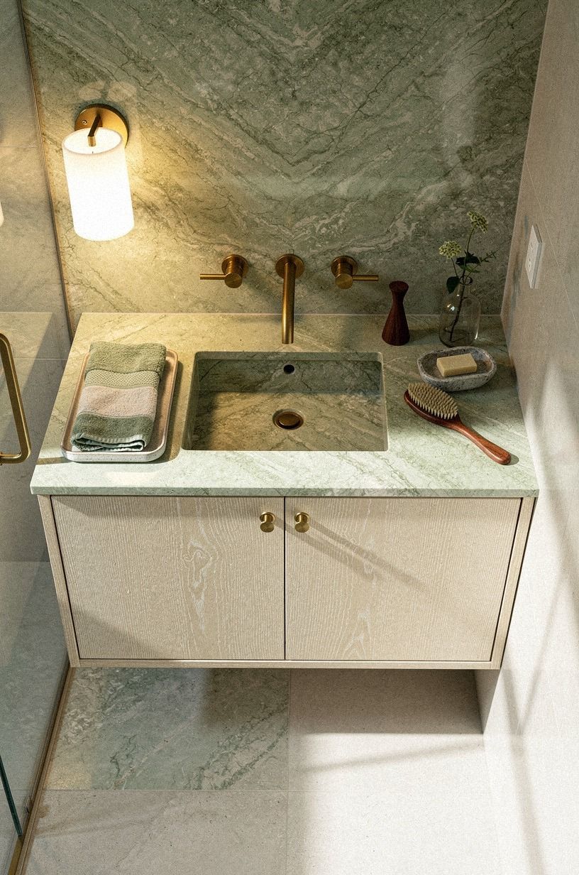 Frame the vanity with bookmatched slabs