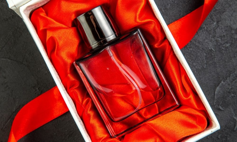 Perfume in a red bottle, 5 best selling colognes with this design