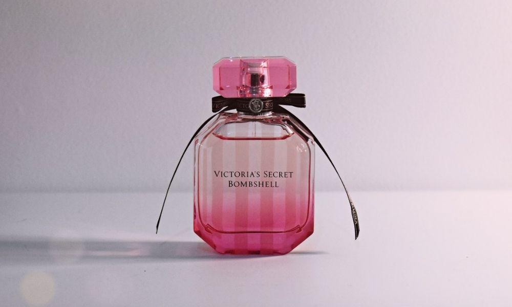 pink bottle of perfume